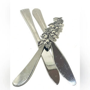 NWT set of Three Stainless Steel Spreaders.​